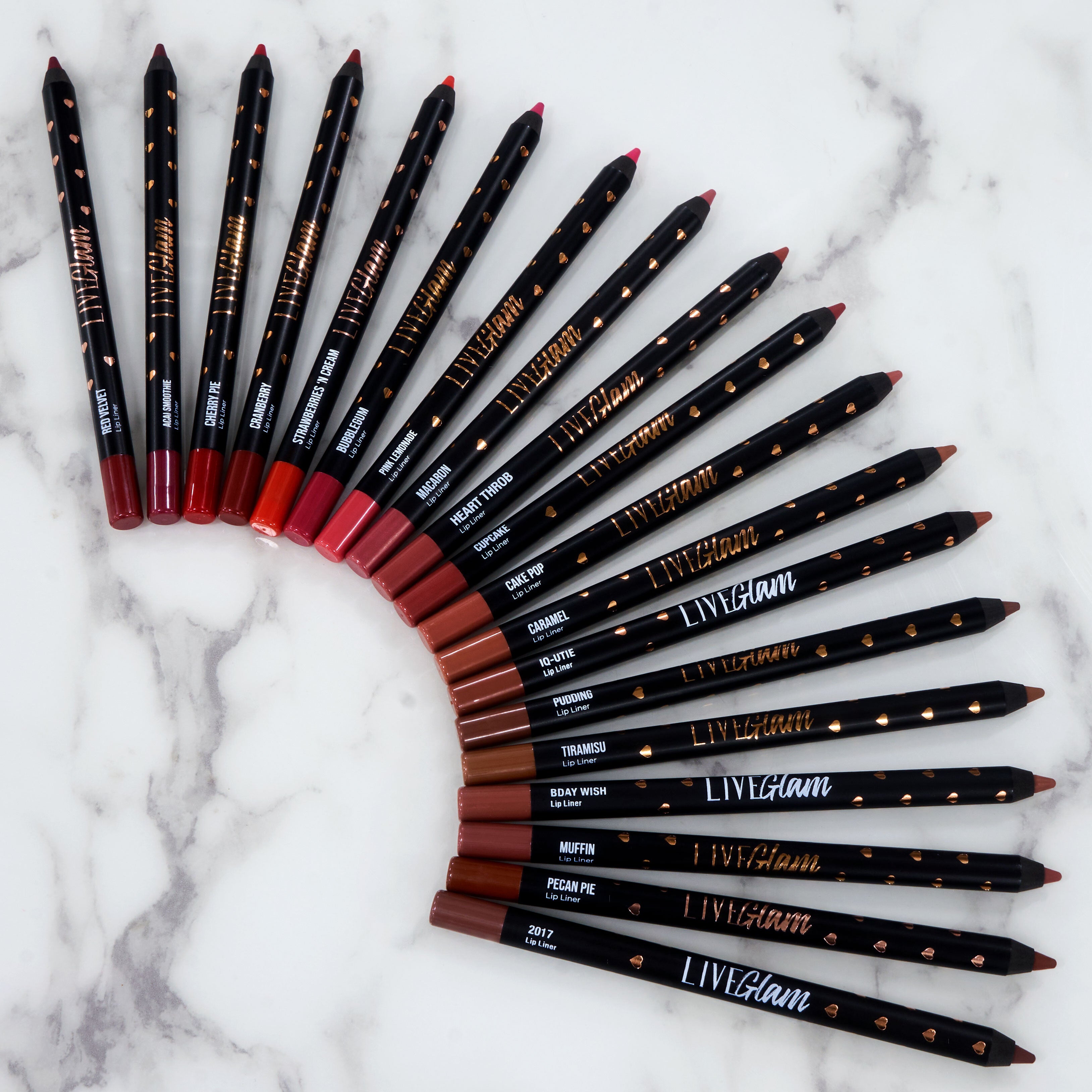 An assorted array of LiveGlam Lip Liners spread out in an arc