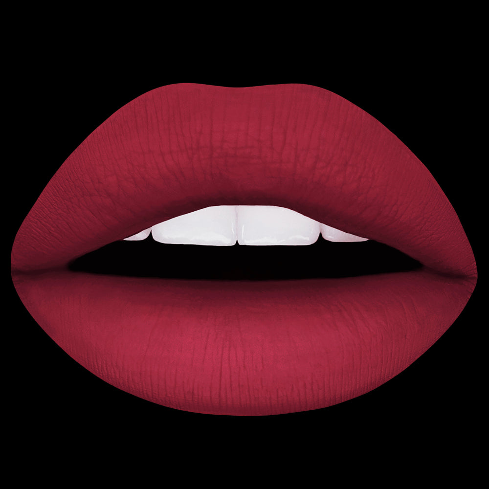 a pair of lips with the red matte liquid lippie Disco Diva shade applied